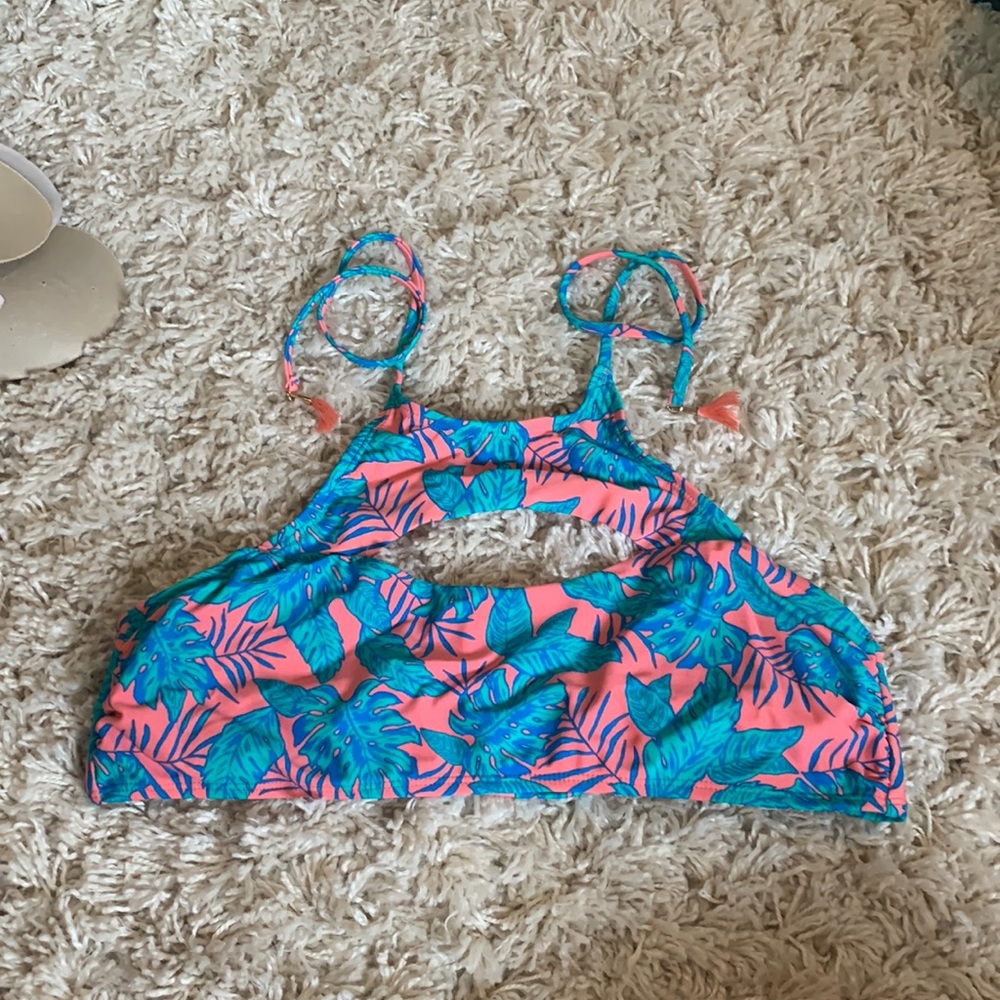 Francesca’s pink and teal bathing suit top